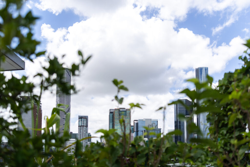 An image of the Brisbane City Skyline, taken from the perspective of the rooftop garden at Brisbane Common Ground.