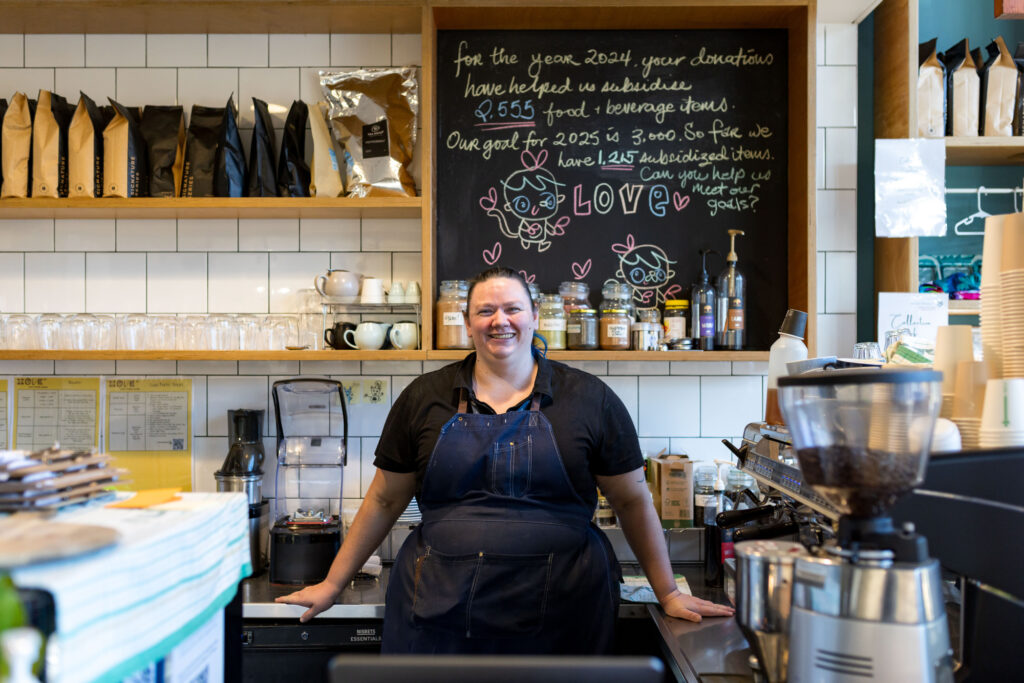 photo of a person standing in a kitchen.