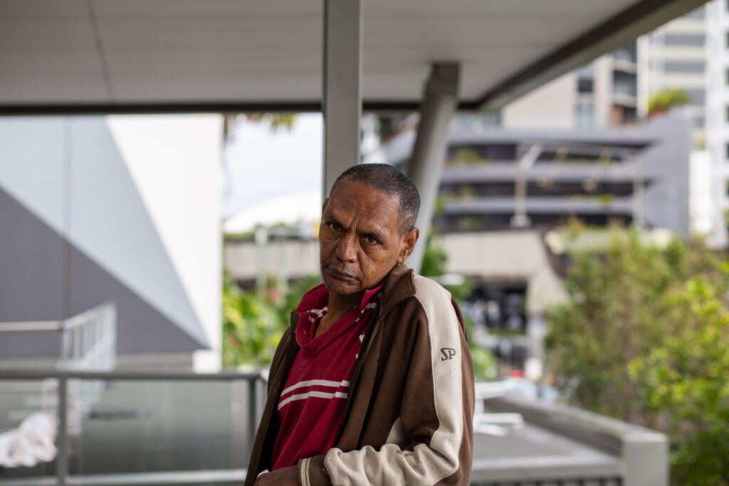 Image of artist looking into the camera.